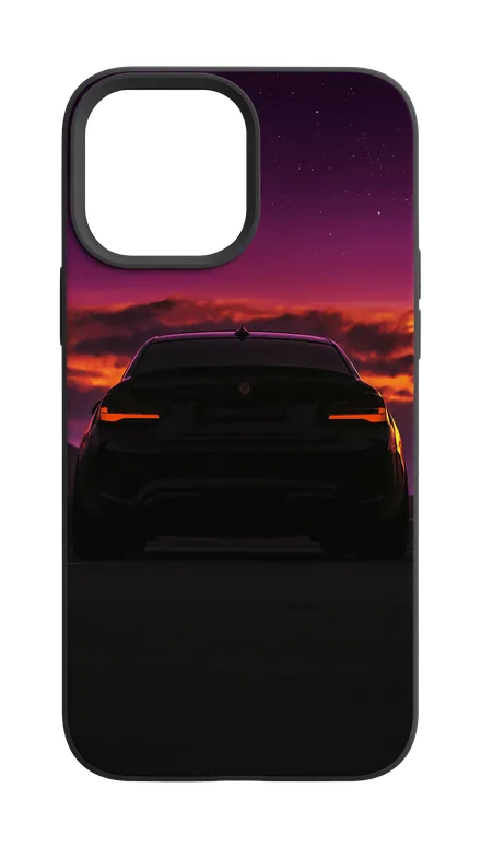 Phone case with car silhouette at sunset